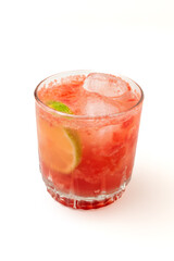 A vibrant red strawberry cocktail or mocktail with crushed ice and a lime wedge garnish, served in a classic glass on a clean white background, perfect for party promotions, and beverage advertisement