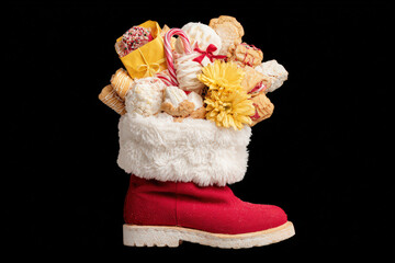 festive santa boot filled with delightful assortment of holiday gifts perfect for creating joyful atmosphere