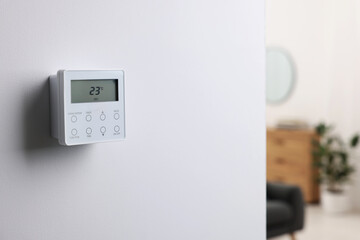 One thermostat on white wall indoors, space for text. Smart home system