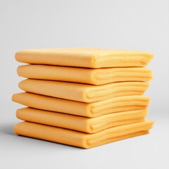 Stack of Soft Yellow Cleaning Cloths for Household Use and Organization