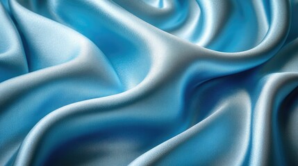 Obraz premium Elegant light blue silk fabric with smooth curves and soft light creating luxury