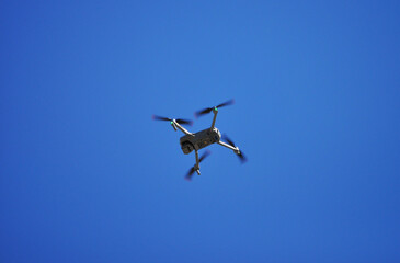 Drone flying and filming from a height