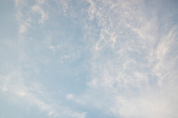 Bright Blue Sky with Soft White Clouds and Clear Atmosphere