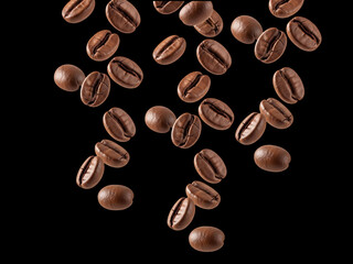 Scattered roasted coffee beans on a white background, perfect for a pattern or texture.