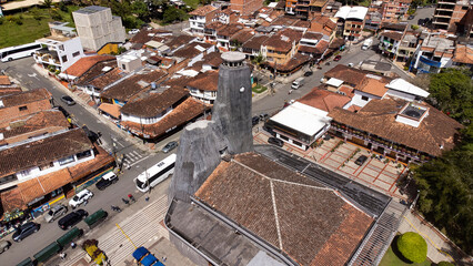 Fototapeta premium El Peñol, Antioquia, Colombia. August 12, 2025. Catholic parish located in the town's main park.