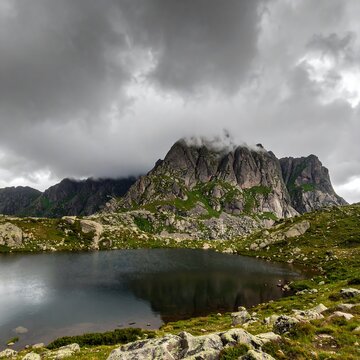 Mountain lake under a stormy sky