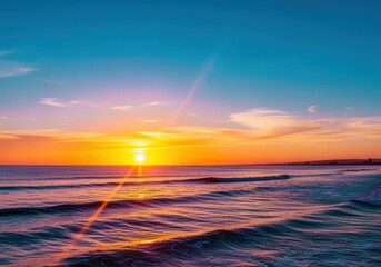 Obraz premium Peaceful coastal sunset illuminating vibrant sky and ocean