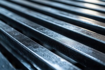 Metal bars aligned diagonally, creating geometric pattern with blue tone. Perfect for industrial, construction, and modern abstract design themes.