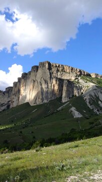 Mountain landscape with cloudy sky