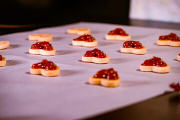Heart shaped cookies with strawberry jam