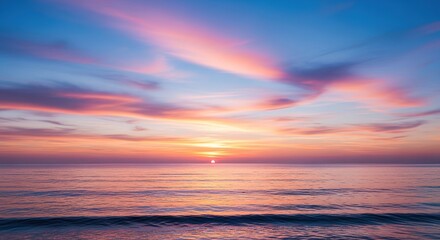 Serene ocean sunset with pastel clouds and gentle waves reflecti