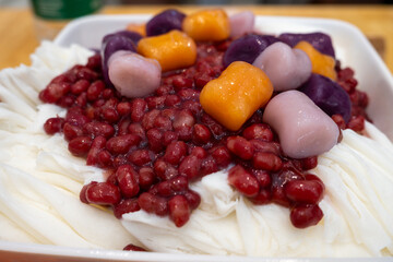 Red Bean Coconut Milk Dessert Topped with Purple Sweet Potato and Pumpkin Cubes
