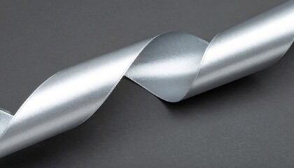 Silver Satin Ribbon on Dark Gray Background
