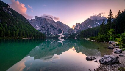 Serene alpine lake at sunrise
