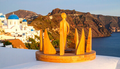 Wooden Sculpture Overlooking Oia and the Aegean Sea in Santorini, Greece