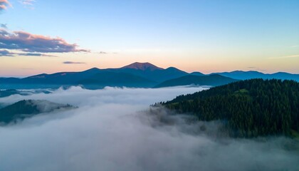 Fototapeta premium Misty mountain range at dawn (1)