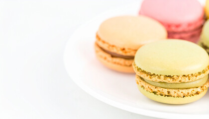Assorted Macarons on a White Plate on a Light Background