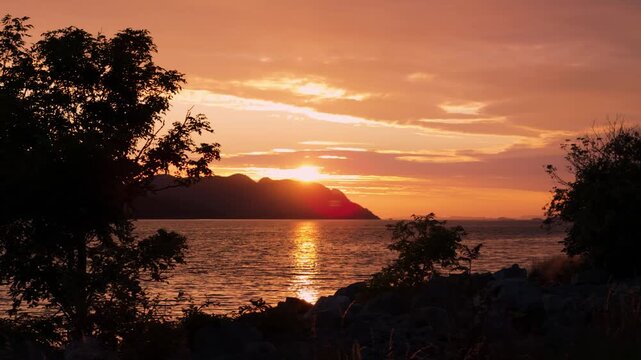 Moving sunset shot with foreground - Norway 4K