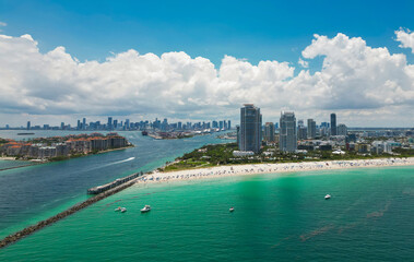Aerial view of Miami Beach skyline. Drone shot of Miami Beach cityscape. Top view of South Miami Beach and the ocean. Miami Beach skyline with skyscrapers and coastline from above.