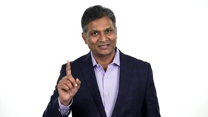 Confident business presentation from handsome businessman explaining key points during a meeting ready for corporate training videos and online courses