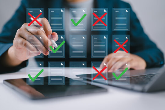 Document verification and approval process with digital checklist for quality control, compliance, and task decision showing accepted and rejected files on laptop by business focusing on data accuracy
