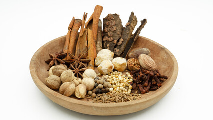 A vibrant array of spices, such as cloves, cinnamon, and nutmeg, are laid out, highlighting Indonesia's historical role in the spice trade and its rich flavors.