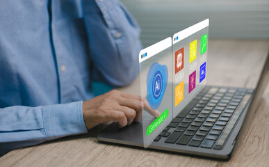Business person using laptop with futuristic AI interface, selecting artificial intelligence applications and digital tools for innovation artificial intelligence generated at workplace.