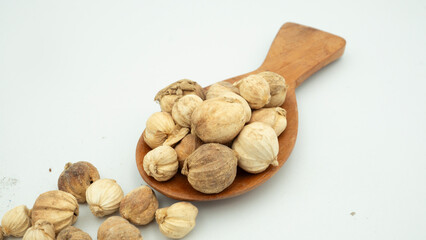 Best cardamom, Siam Cardamom or Kapulaga isolated on white background. Dried seeds, dried herb spice. © scribble pict