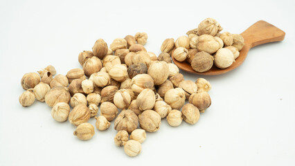 Best cardamom, Siam Cardamom or Kapulaga isolated on white background. Dried seeds, dried herb spice.