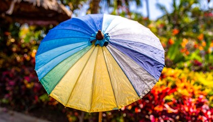 Vibrant colorful umbrella in a garden setting