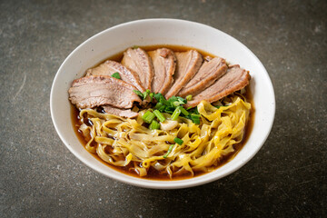 egg noodles with stewed duck in brown soup
