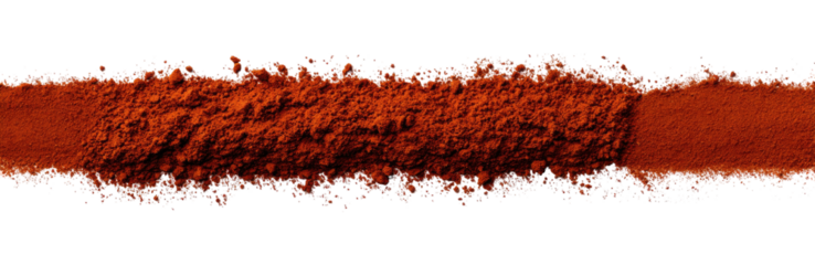 A long, horizontal swath of dark-red, powdered spice, with small, scattered particles of various colors