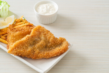 fish and chips - fried fish fillet with potatoes chips