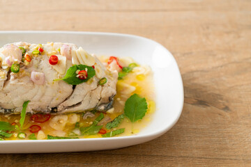 steamed sea bass fish with herbs