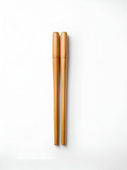 Two wooden drumsticks on white background, top view