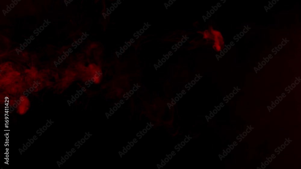 Poster red smoke rings are blown from left and float across a dark screen before dissipating, mysterious ef