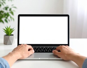 A first-person perspective of hands on a keyboard with a modern laptop featuring a blank white screen for mockups on a clean desk.