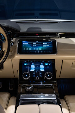 Range Rover Velar center console with dual touchscreens, High-tech luxury SUV interior

