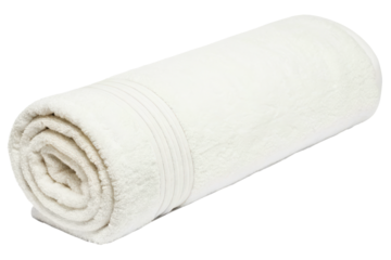 Clean white terry cloth towel rolled up for a relaxing spa isolated with transparent background