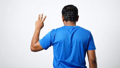 Asian man wearing blue tshirt over isolated white background and counting number with fingers. Rear view. Detailed high quality image. 