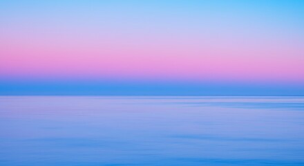 Soft pastel sky over water