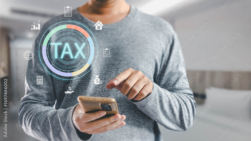 Poster man using smartphone to access online tax service with futuristic interface displaying tax and finan