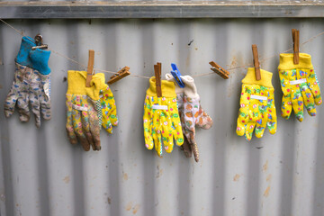 Gardening gloves hanging in the garden shed