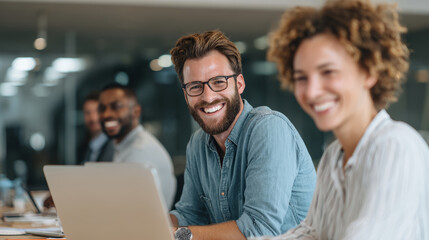 Smiling colleagues teamwork office laptop business meeting collaboration professional happy workspace