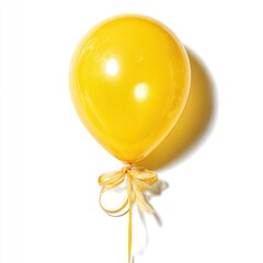 Single yellow balloon tied with a ribbon. Isolated on white background with a shadow behind it