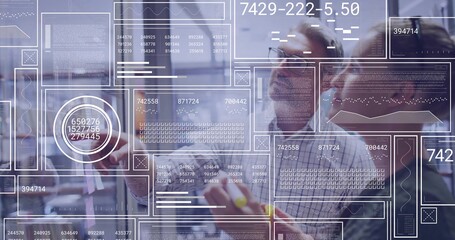 Pointing stylus bearded man in checked shirt analyzing charts on transparent display in tech office