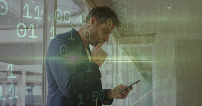 Standing executive holding smartphone and thinking in glass office corridor, with binary code