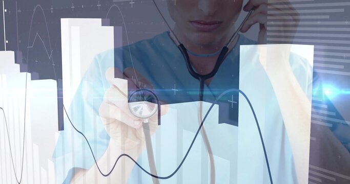 Doctor in scrubs holding smartphone and moving stethoscope to interface in clinic, with ECG chart