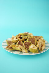 Healthy dried figs arranged on a colorful plate