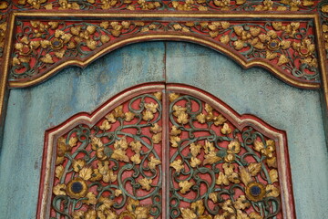 Traditional Balinese Carved Wooden Gates Painted in Multiple Colors